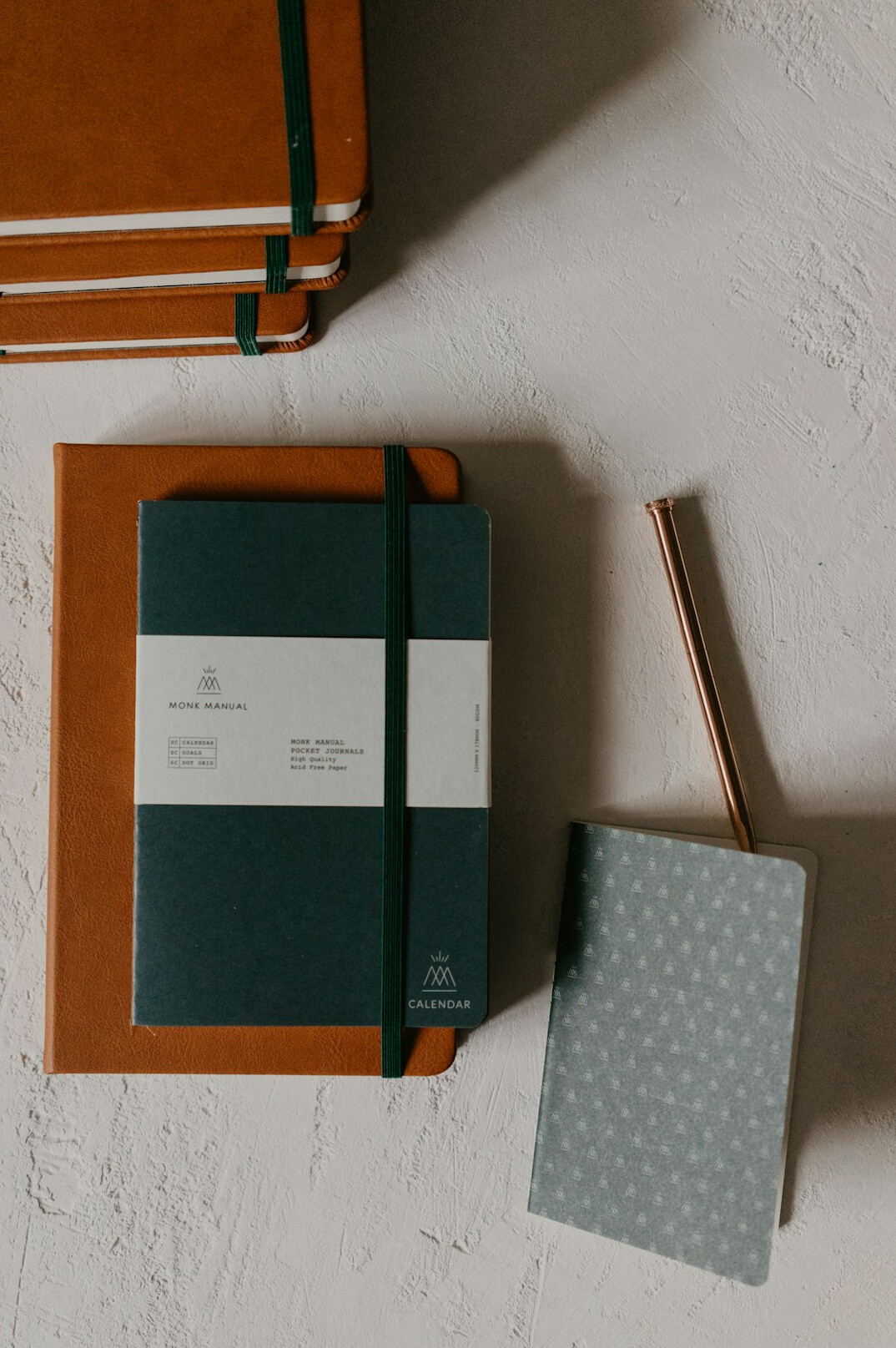 Notebook and pen on a wooden desk
