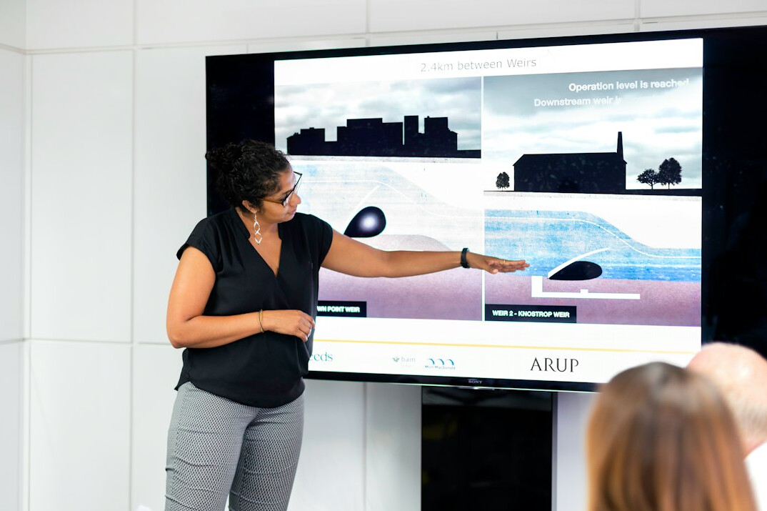 woman leading business presentation